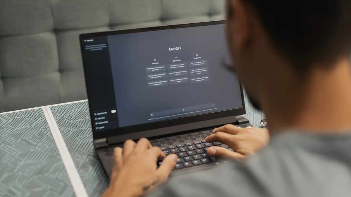 Our AI Writing Software Review Criteria Our AI Writing Software Review Criteria — Man Using ChatGPT AI System
