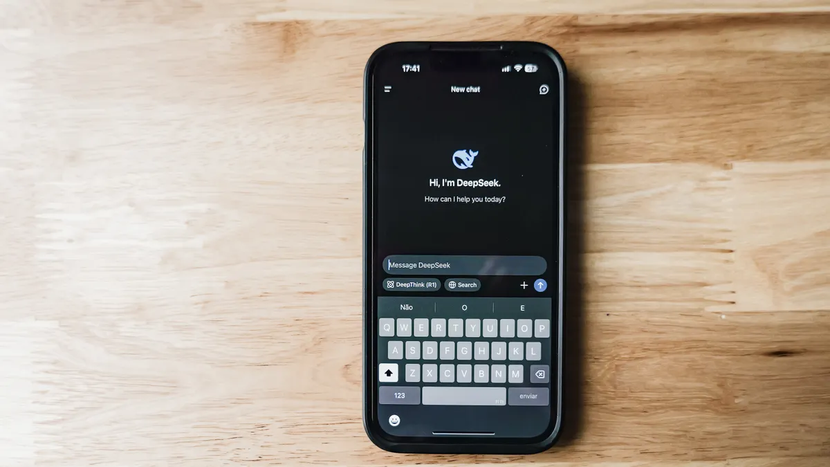 Writesonic Review — Smartphone Displaying AI Chatbot Interface